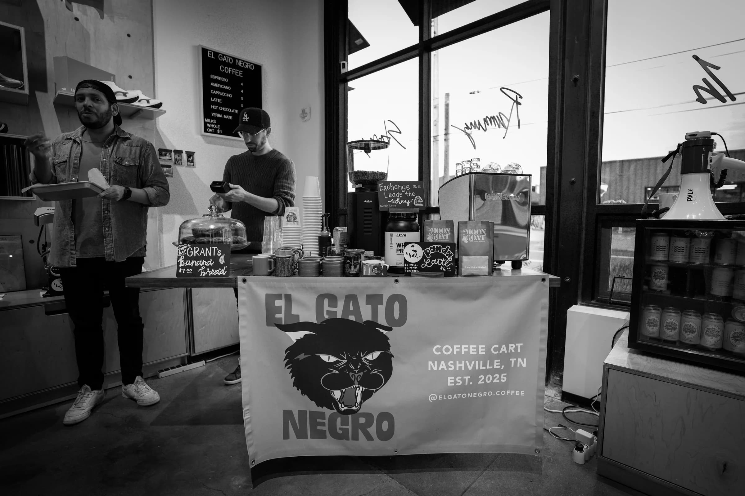 Phil and Juan working the El Gato Negro cart during a service moment at The Exchange