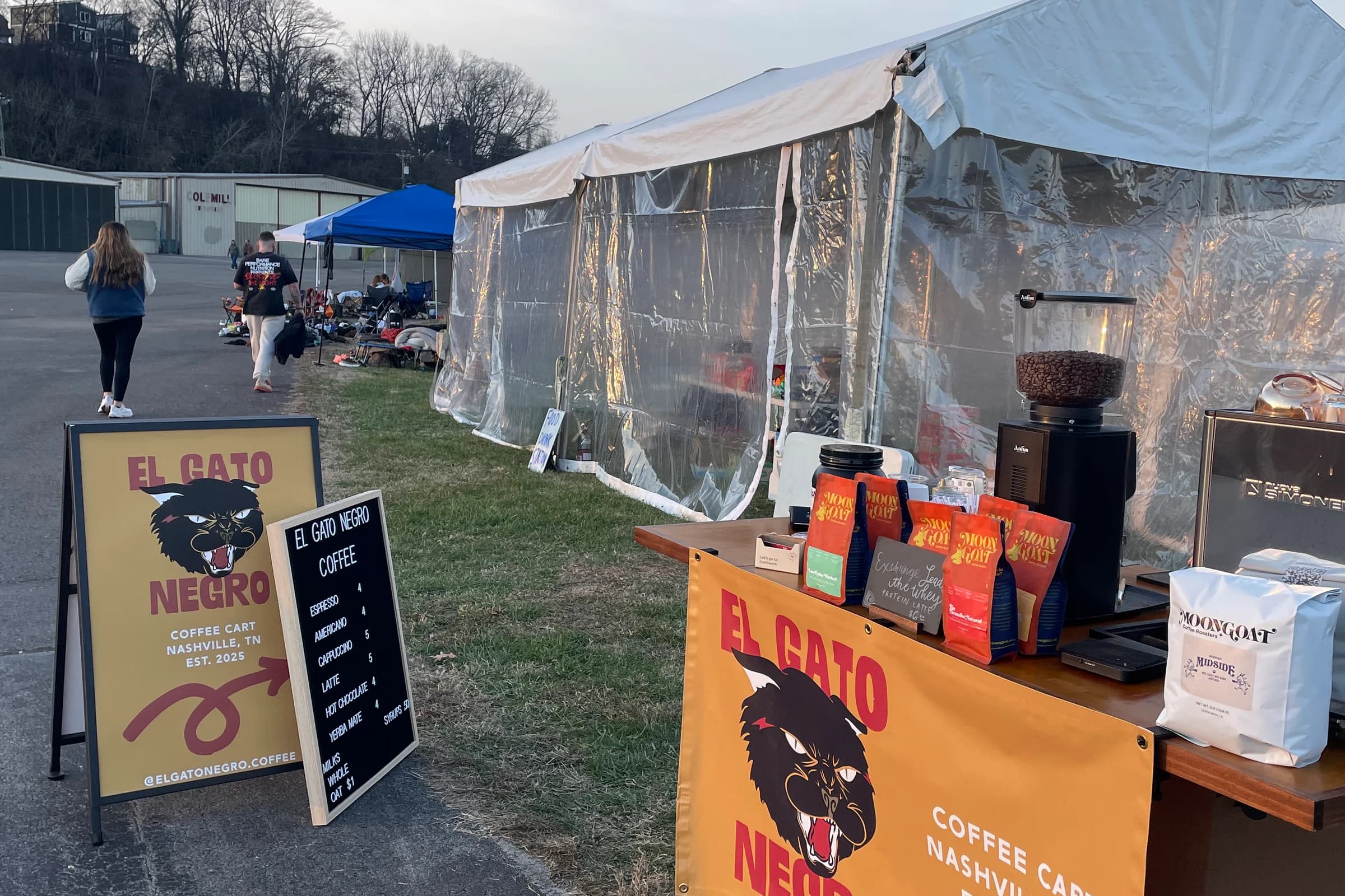 El Gato Negro cart with Last Man Standing branded signage during service